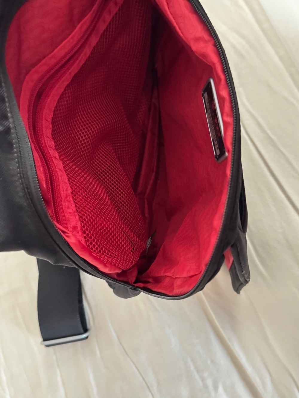 Tumi Black Travel Sling Bag with Red Trim - Picture 5 of 6